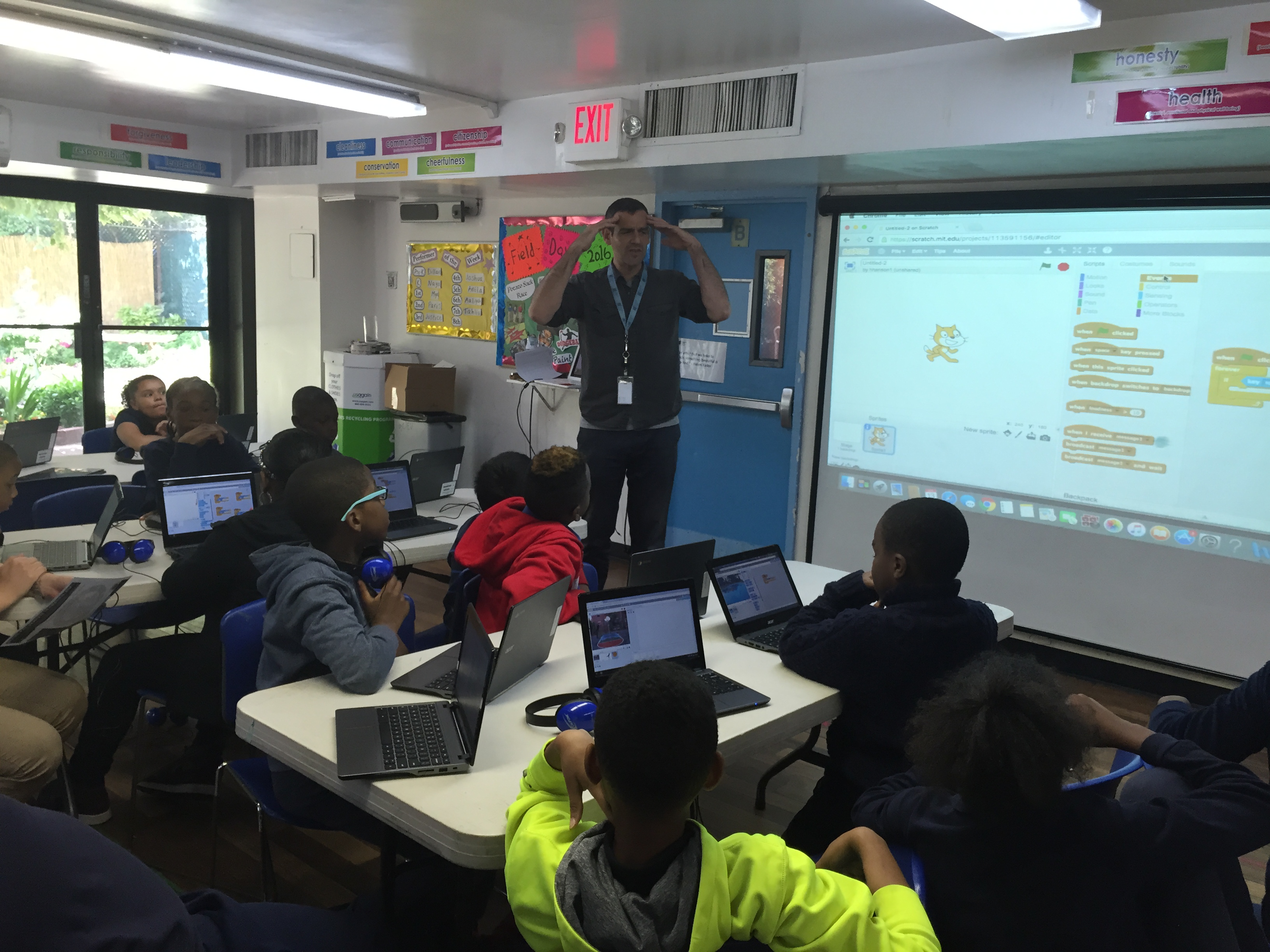 Students at Storefront Academy Harlem learn about coding with Scratch